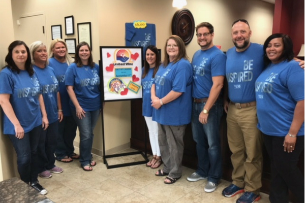 Bankers wearing United Way Serve shirts