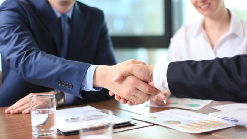 Handshake in a business setting