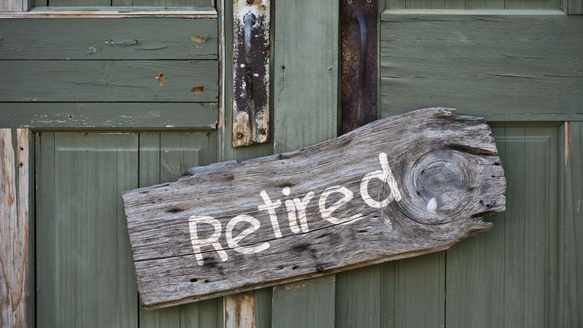 Door with Retired sign on it