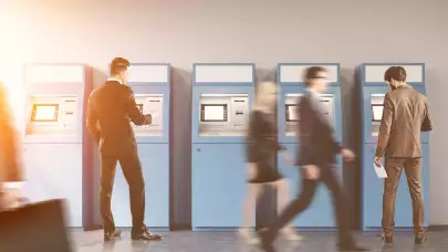 action shot of people in front of ATM bank