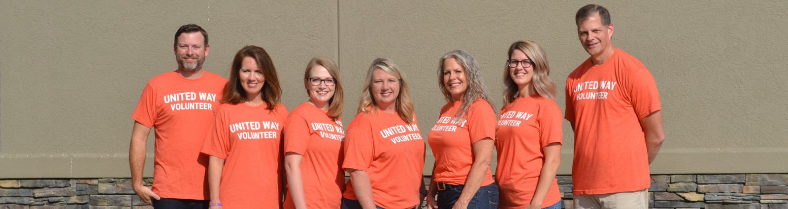Community - group of people in United Way Serve shirts