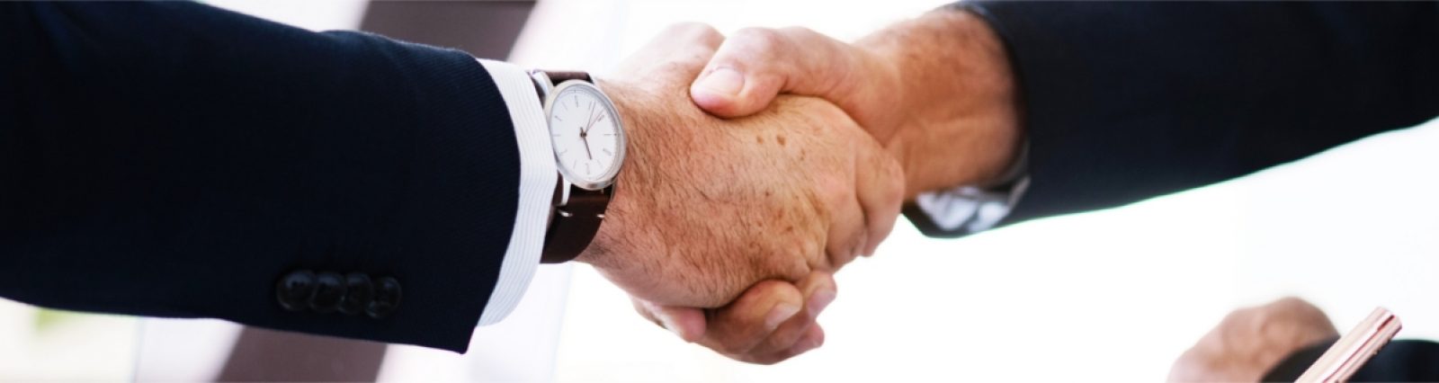 Banking is Personal - Two men shaking hands